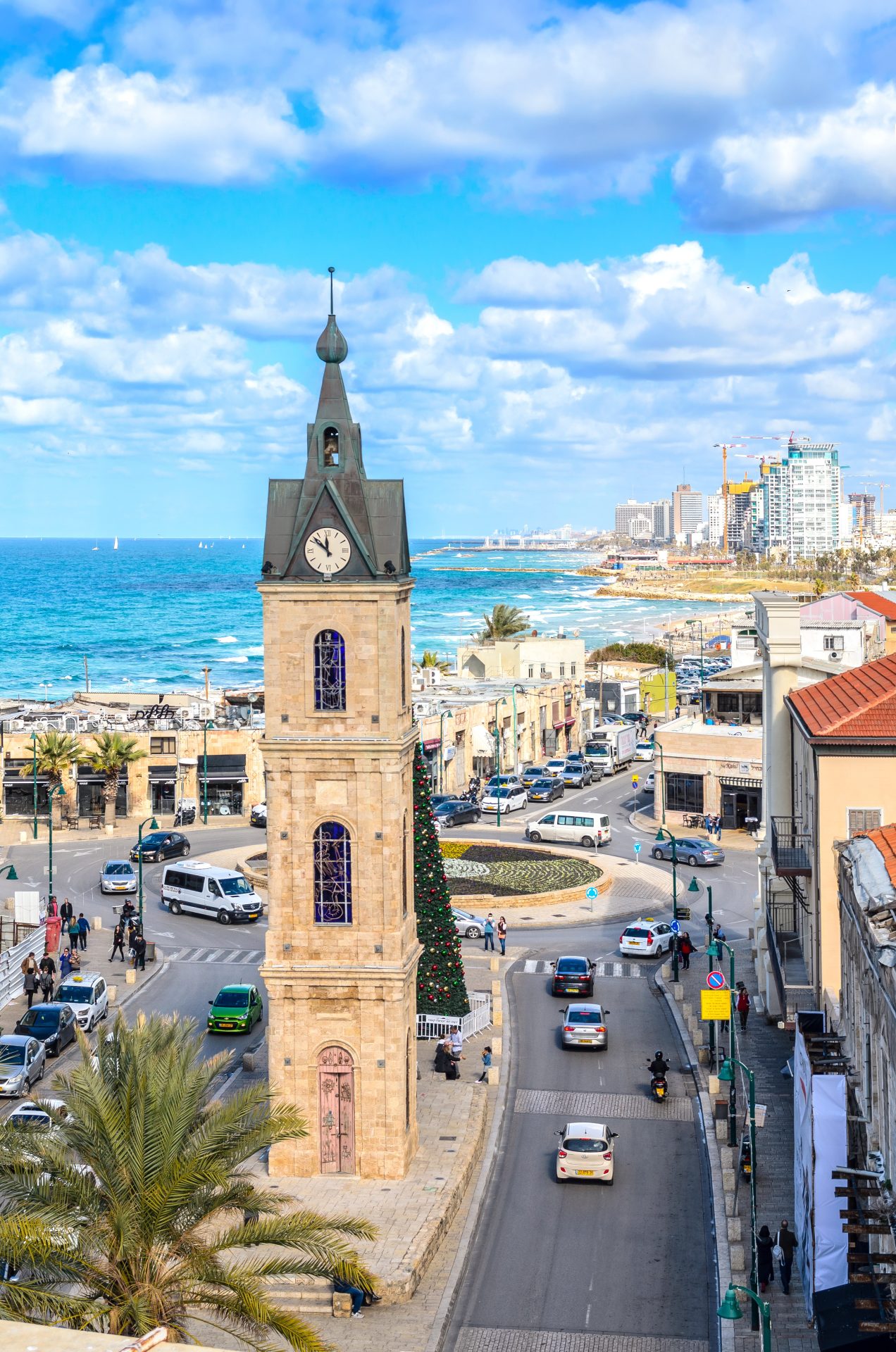 Jaffa old city clock tower. Tel Aviv in the background